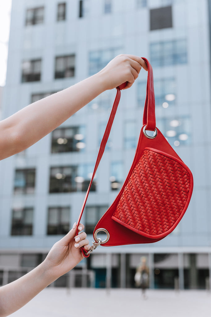 Elegant Weaved Flap Bag in Red Leather with Long Adjustable Strap.